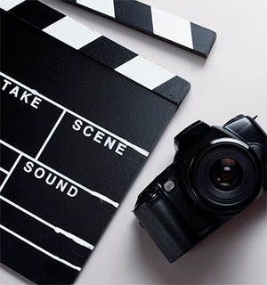 Movie Clap Board and Photography Camera